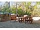 Cozy brick patio with a wooden furniture set, perfect for outdoor gathering at 1112 Western Ave, Rocky Mount, NC 27804