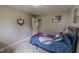 Comfortable bedroom showcasing baseball-themed décor and a cozy atmosphere at 112 Tillburg Ln, Hurdle Mills, NC 27541