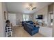 Spacious living room with vaulted ceiling, plush seating, and a large window at 112 Tillburg Ln, Hurdle Mills, NC 27541