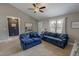 Comfortable living room with plush seating and plenty of natural light at 112 Tillburg Ln, Hurdle Mills, NC 27541