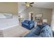Inviting living room with vaulted ceilings, comfortable seating, and open to the dining area at 112 Tillburg Ln, Hurdle Mills, NC 27541