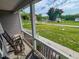 View from the porch of green lawn and neighborhood beyond at 112 Tillburg Ln, Hurdle Mills, NC 27541