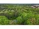 Aerial view of a home among lush greenery, showcasing a private retreat in a serene setting at 113 Denard St, Oxford, NC 27565