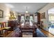 Formal dining room featuring a large table and classic furnishings under a chandelier at 113 Denard St, Oxford, NC 27565