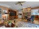 Inviting living room with fireplace, TV, and bar area perfect for entertaining at 113 Denard St, Oxford, NC 27565