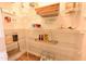 Organized pantry with wire shelving holding a variety of food items and supplies at 1145 Raven Perch Dr, Wendell, NC 27591
