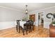 Traditional dining room featuring a wooden hutch and views to the adjacent kitchen at 1207 Candlewood Dr, Elon, NC 27244