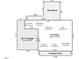 First floor blueprint showing kitchen, living room, garage, dining room and laundry at 1207 Candlewood Dr, Elon, NC 27244
