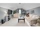 Upstairs living room with two couches and built in shelves at 1207 Candlewood Dr, Elon, NC 27244