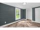 Bedroom featuring wood-look flooring and closet at 1219 Junction Rd, Durham, NC 27704