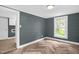 Bedroom featuring wood-look flooring and closet at 1219 Junction Rd, Durham, NC 27704