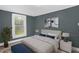 Bedroom with a cozy bed, soft lighting, and tranquil decor at 1219 Junction Rd, Durham, NC 27704