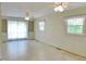 Living room with built-in shelving and two windows at 122 E Orange St, Hillsborough, NC 27278