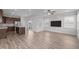 Spacious living room open to the kitchen, with plenty of natural light at 140 Azure Mist Dr, Raleigh, NC 27610