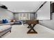 Finished basement featuring a foosball table, media setup, and comfortable seating at 1416 Bailey Hill Dr, Raleigh, NC 27614
