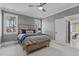 Bright bedroom with large windows, a comfortable bed, and tasteful decor at 1416 Bailey Hill Dr, Raleigh, NC 27614