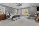 Spacious bedroom with a comfortable bed, neutral colors, and ample natural light at 1416 Bailey Hill Dr, Raleigh, NC 27614