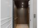 A wood-paneled elevator offers a unique and convenient feature at 1416 Bailey Hill Dr, Raleigh, NC 27614