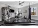 Well-equipped home gym featuring modern exercise equipment and a functional layout at 1416 Bailey Hill Dr, Raleigh, NC 27614