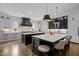 Spacious modern kitchen with two islands, marble countertops, and pendant lighting at 1416 Bailey Hill Dr, Raleigh, NC 27614
