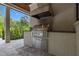 Outdoor kitchen with stainless steel grill, prep area, and cabinetry at 1416 Bailey Hill Dr, Raleigh, NC 27614