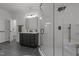 This open-concept bathroom features a frameless shower and a vanity with modern fixtures at 1416 Heritage Links Dr, Wake Forest, NC 27587
