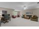 Spacious bonus room with plush carpeting, fan and comfortable seating at 1416 Heritage Links Dr, Wake Forest, NC 27587