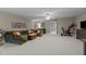 Spacious bonus room featuring plush carpeting, neutral paint and ceiling fan at 1416 Heritage Links Dr, Wake Forest, NC 27587