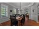 Inviting dining room with wood floors, chandelier, and views to the living room at 1416 Heritage Links Dr, Wake Forest, NC 27587