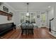 Bright dining area with natural light, hardwood floors, and views of backyard at 1416 Heritage Links Dr, Wake Forest, NC 27587