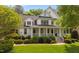Charming two-story traditional home with a covered front porch and manicured landscaping at 1416 Heritage Links Dr, Wake Forest, NC 27587