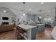 Open concept kitchen with large island, stainless appliances, and views to the Gathering room at 1416 Heritage Links Dr, Wake Forest, NC 27587