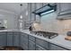 Kitchen featuring gas cooktop, white countertops, stainless appliances, and wooden flooring at 1416 Heritage Links Dr, Wake Forest, NC 27587