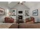 Cozy living room with fireplace, built-in shelves, and comfortable seating at 1416 Heritage Links Dr, Wake Forest, NC 27587
