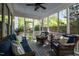 Cozy screened porch with comfortable seating, perfect for enjoying the outdoors bug-free at 1416 Heritage Links Dr, Wake Forest, NC 27587