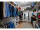Organized walk-in closet includes shelving, hanging rods, and access to the bedroom at 1416 Heritage Links Dr, Wake Forest, NC 27587