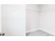 Walk-in closet features custom shelving and neutral walls at 147 Little Crk Dr, Lillington, NC 27546