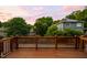 Enjoy sunset views from this property's spacious outdoor deck, perfect for entertaining or relaxing in the evening at 1508 W Markham Ave, Durham, NC 27705