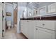 Bathroom featuring a vanity with a granite countertop, white cabinetry, and a toilet at 1605 Hunting Ridge Rd, Raleigh, NC 27615