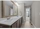 Bathroom featuring double sinks and access to the Primary bedroom at 164 Tillburg Ln, Hurdle Mills, NC 27541