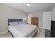 Comfortable bedroom featuring a queen bed, dresser, and neutral decor for a relaxing retreat at 164 Tillburg Ln, Hurdle Mills, NC 27541