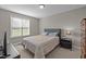Neutral bedroom with a queen bed near a bright window for ample natural light at 164 Tillburg Ln, Hurdle Mills, NC 27541