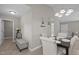 Dining area with elegant chandelier and carpet, perfect for hosting dinner parties at 164 Tillburg Ln, Hurdle Mills, NC 27541