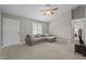 Cozy living room featuring neutral tones, plush sectional sofa, and ample natural light at 164 Tillburg Ln, Hurdle Mills, NC 27541