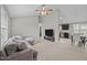 Open concept living room flowing into the dining area and kitchen at 164 Tillburg Ln, Hurdle Mills, NC 27541