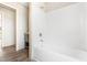 The bathroom showcases a pristine white bathtub and shower, as well as a vanity sink at 17 Star Dust Ln, Selma, NC 27576