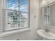 Bathroom with sink and window offering neighborhood views at 1844 Austin Ridge Pkwy, Wake Forest, NC 27587