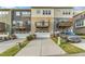 Modern townhomes featuring private balconies and driveways, offering a blend of style and functionality at 1844 Austin Ridge Pkwy, Wake Forest, NC 27587