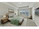 Serene main bedroom with tray ceiling, large windows, and plush carpeting at 1844 Austin Ridge Pkwy, Wake Forest, NC 27587