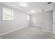 Bedroom featuring neutral carpet, window, and a closet at 1903 Meadowbrook St, Sanford, NC 27330